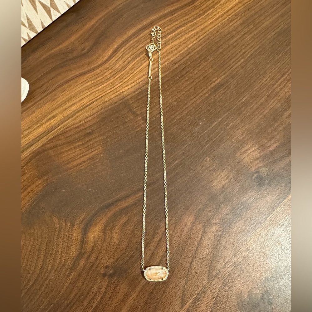 Pink and gold kendra scott necklace